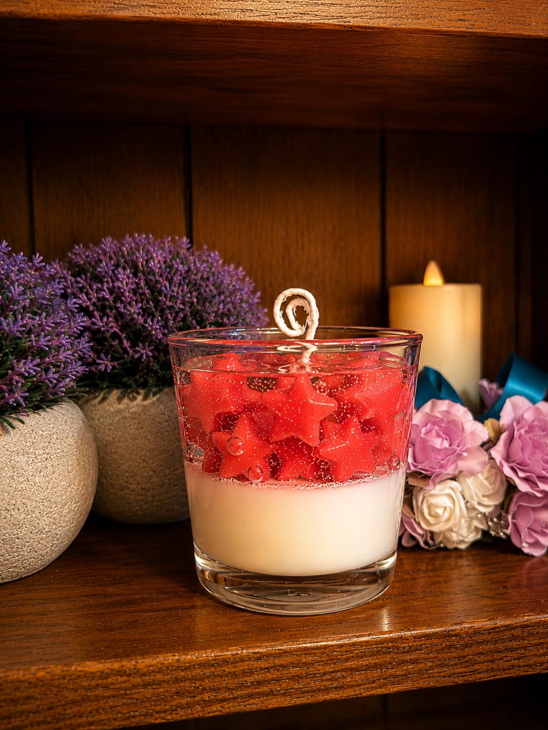 Layered candle with red star embeds