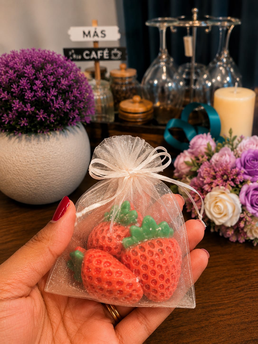 Strawberry-shaped wax melts in an organza gift bag
